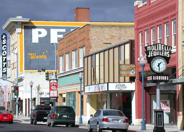 Storefronts and a street clock along historic downtown Pocatello, Bannock County, Idaho.
